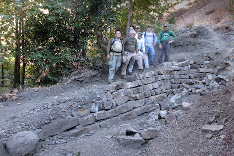 view of volunteers and work area