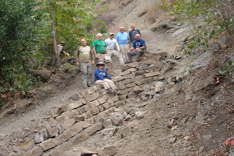 view of volunteers and work area